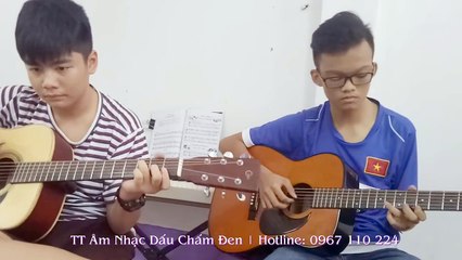 Lớp học đàn guitar cơ bản ở tphcm - Dấu Chấm Đen