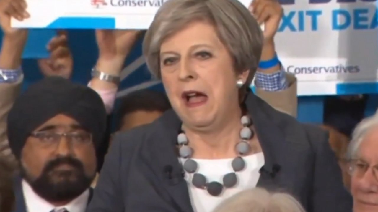 Theresa May vows to change human rights laws to...