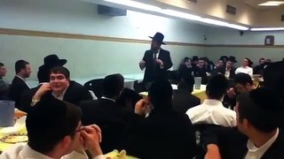 63.Mir Reb Nissin Kaplan speaking at a melava malka in Mir Yeshiva