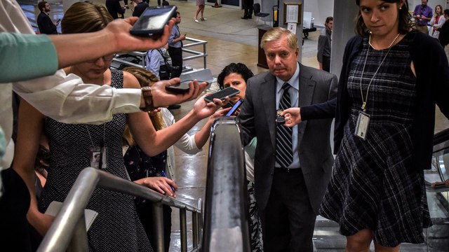 Journalists crowd Capitol hallways