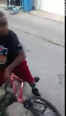 young boy does a drive by fight