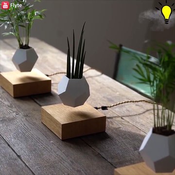 Des pots de fleurs en lévitation... Je veux les même chez moi!