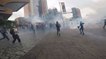 Clouds of Tear Gas Fill Caracas Streets as Protesters Run for Cover