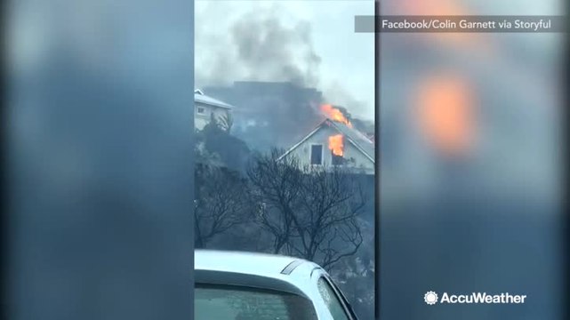 At least 9 killed after powerful storm fuels fires in South Africa