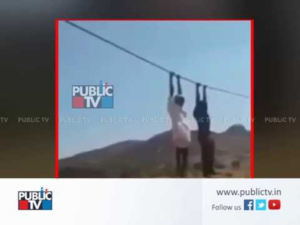 Farmers hold hightension electric wire in a way to protest for more compensation