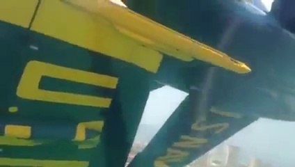 The Blue Angels in tight formation.