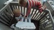 Moment a toddler helps his baby brother escape from his crib