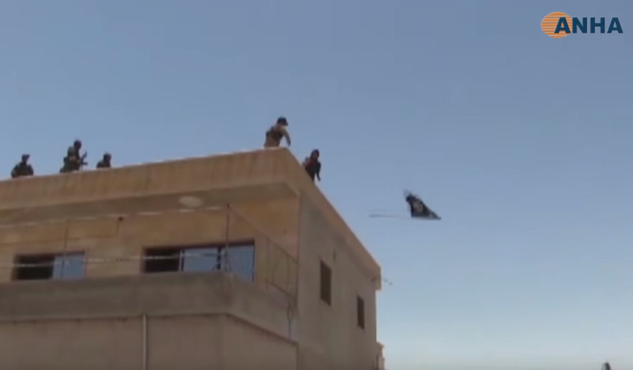 SDF Lower Islamic State Flag in Recaptured Town West of Raqqa