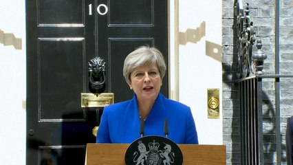 Theresa May announces new government with DUP