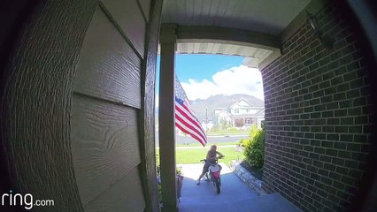 Boy Says Pledge of Allegiance to Flag at Doorstep