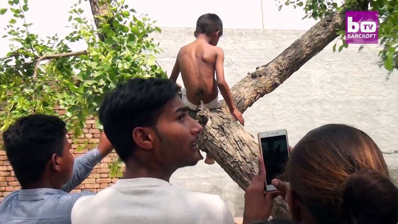 Meet 8-year-old boy who has a long furry tail is worshipped as a god