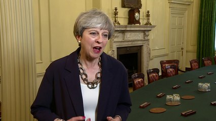 Theresa May defends her cabinet reshuffle
