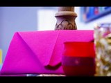 Faire un pliage de serviette en forme d'enveloppe