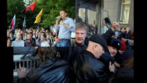 Putin critic Alexei Navalny detained before Moscow protest