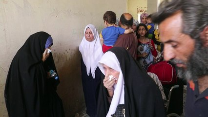 Des civils terrifiés fuient les balles de l'EI à Mossoul
