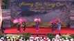 Vietnamese folk dance and song with  traditional paper fan
