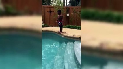 Kid Pumps Himself Up for Pool Jump