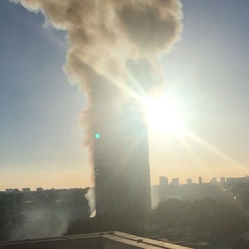 Dawn Breaks as London High-Rise Continues to Burn