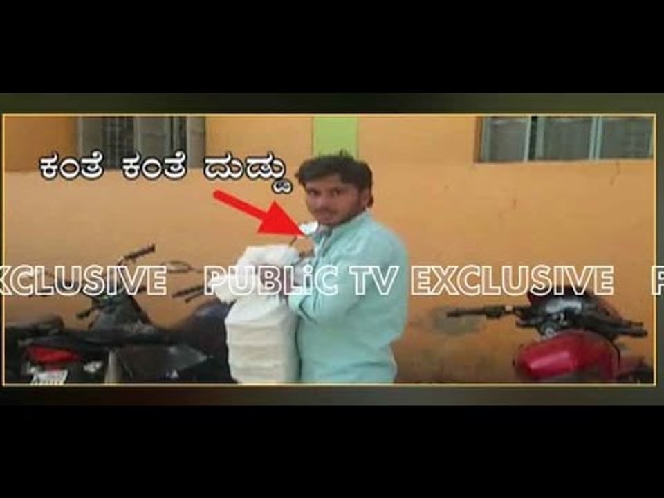 Person seen carrying lakhs of rupees in bag after Note Exchange in Bank at Pavagada in Tumakuru