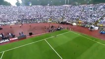 Guy Rides A Drone To Deliver A Game Ball At A Soccer Game
