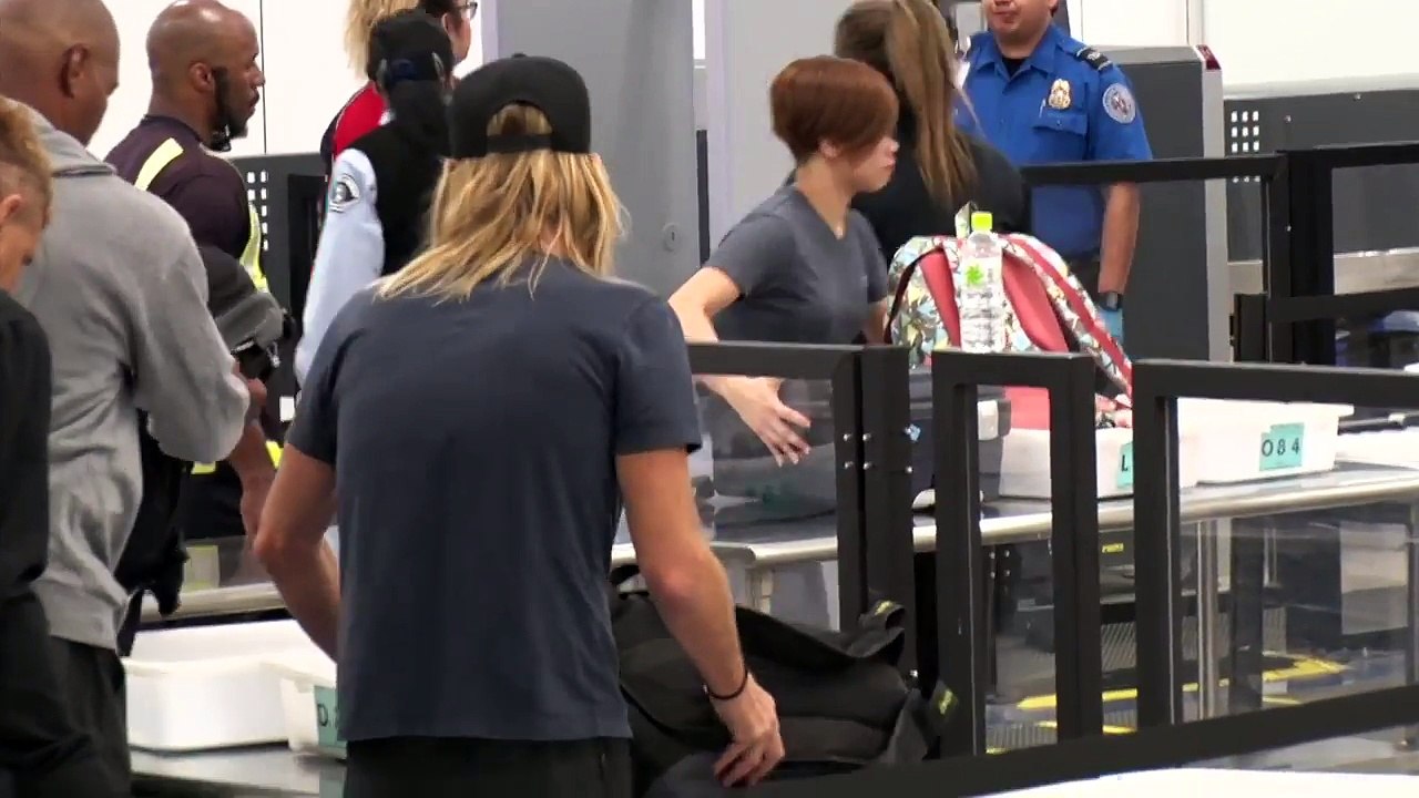 Foo Fighters Drummer Taylor Hawkins Handles Enhanced Pat-Down By LAX TSA Like A Champ
