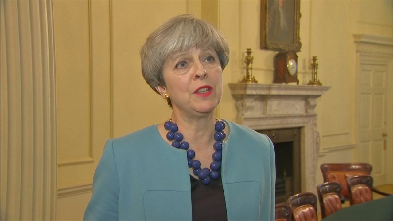 Theresa May promises 'proper' investigation into Grenfell Tower fire