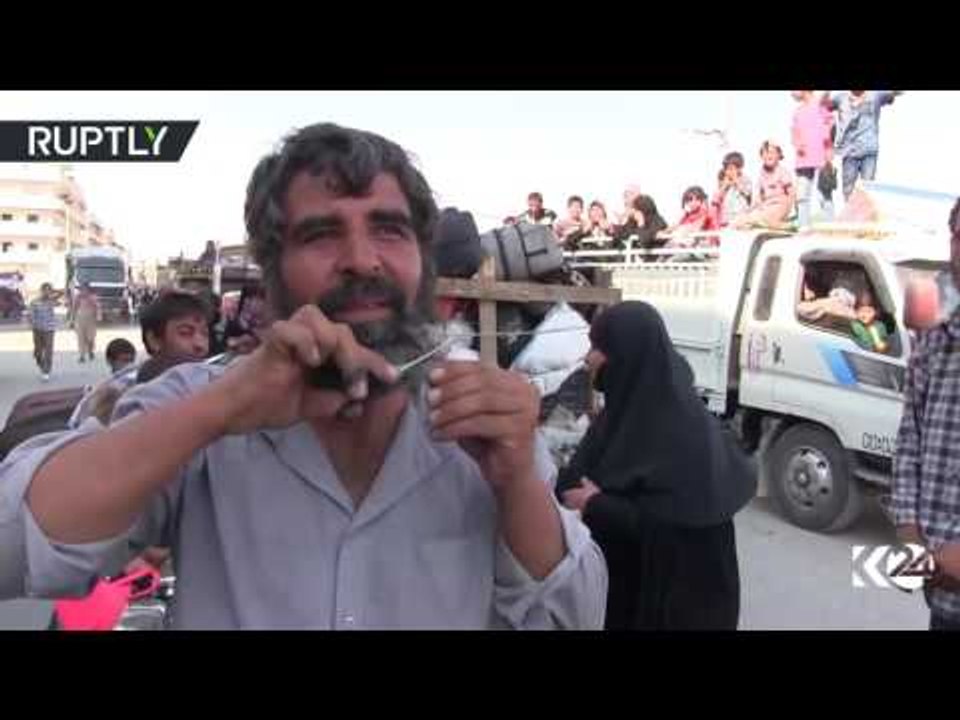 Women burn burqas, men cut beards: Manbij celebrates liberation from ISIS