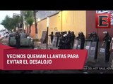 Enfrentamiento entre policías y civiles por desalojo de predio en la Álvaro Obregón