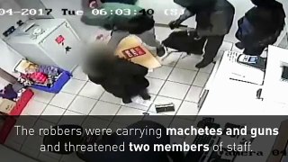 05.Dramatic CCTV footage shows armed robbers raiding Wigan newsagent