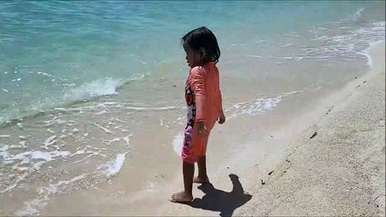 Baby Playing Star Fish and Beach Sand - Donna The