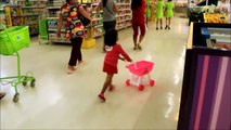 Baby Doing Grocery Shopping at Supermarket with Toy Shopping Cart - Donna The