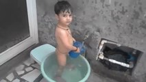 LITTLE CUTE BABY BOY bathing & PLAYING in indian st