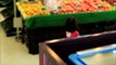 Baby Doing Grocery Shopping at Supermarket with Toy Shopping Cart - Donna Th