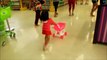 Baby Doing Grocery Shopping at Supermarket with Toy Shopping Cart - Donna The