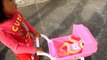 Little Girl Pushing Pink Stroller Baby Alive - Donna The
