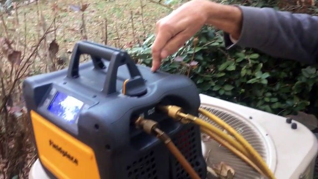 Fieldpiece MR45 recovery unit recovering refrigerant from an air conditione