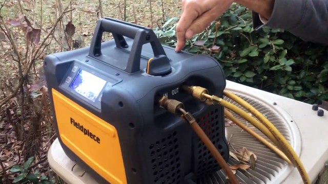 Fieldpiece MR45 recovery unit recovering refrigerant from an air conditione