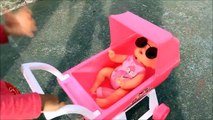 Little Girl Pushing Pink Stroller Baby Alive - Donna The E