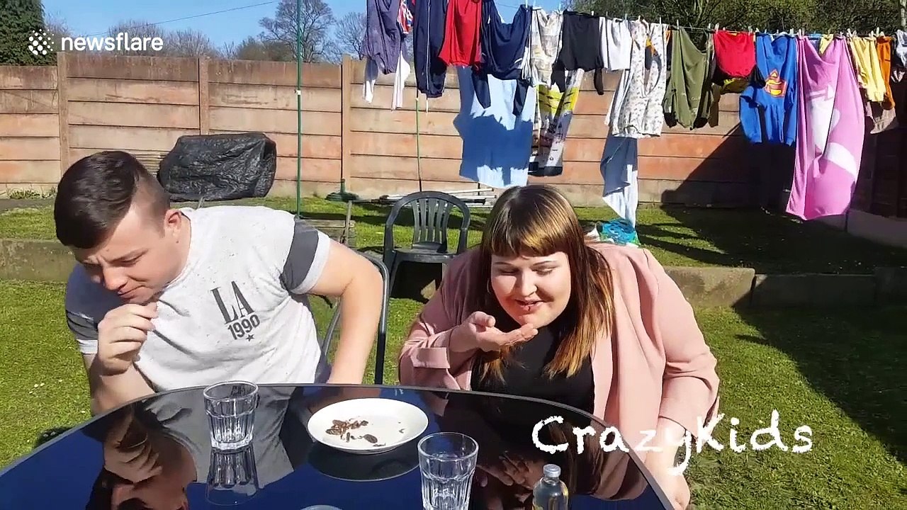 Couple gag as they eat scorpions and drink scorpion vodka