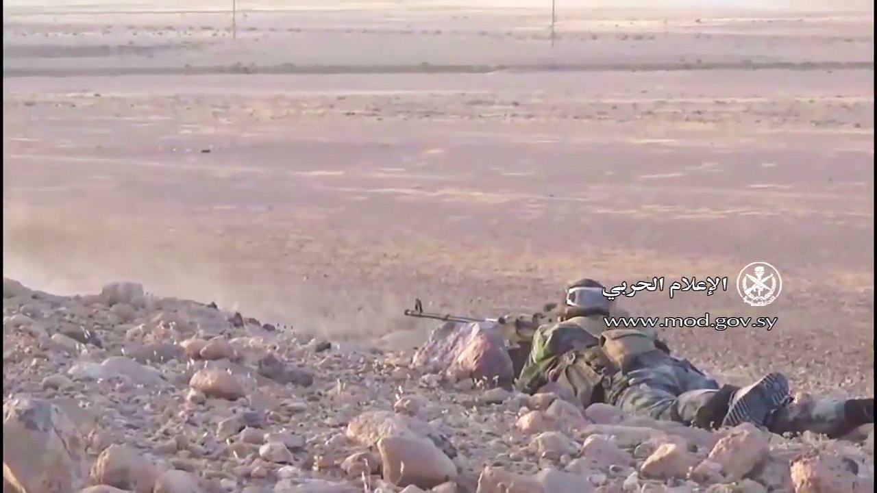Syria Army Machine Gunner Has Close Call With Incoming Rounds