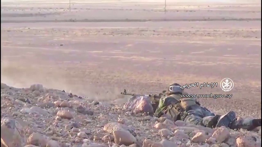 Syria Army Machine Gunner Has Close Call With Incoming Rounds