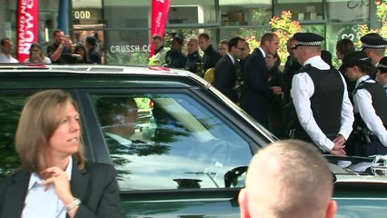 Grenfell: Prince William promises to return as he is heckled