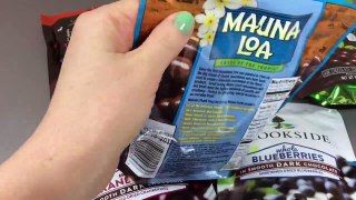 Opening and tasting chocolates from Hawaii , Switzerland