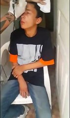 Ce gamin se fait sévèrement punir par un tatoueur brésilien, pour avoir volé... un vélo