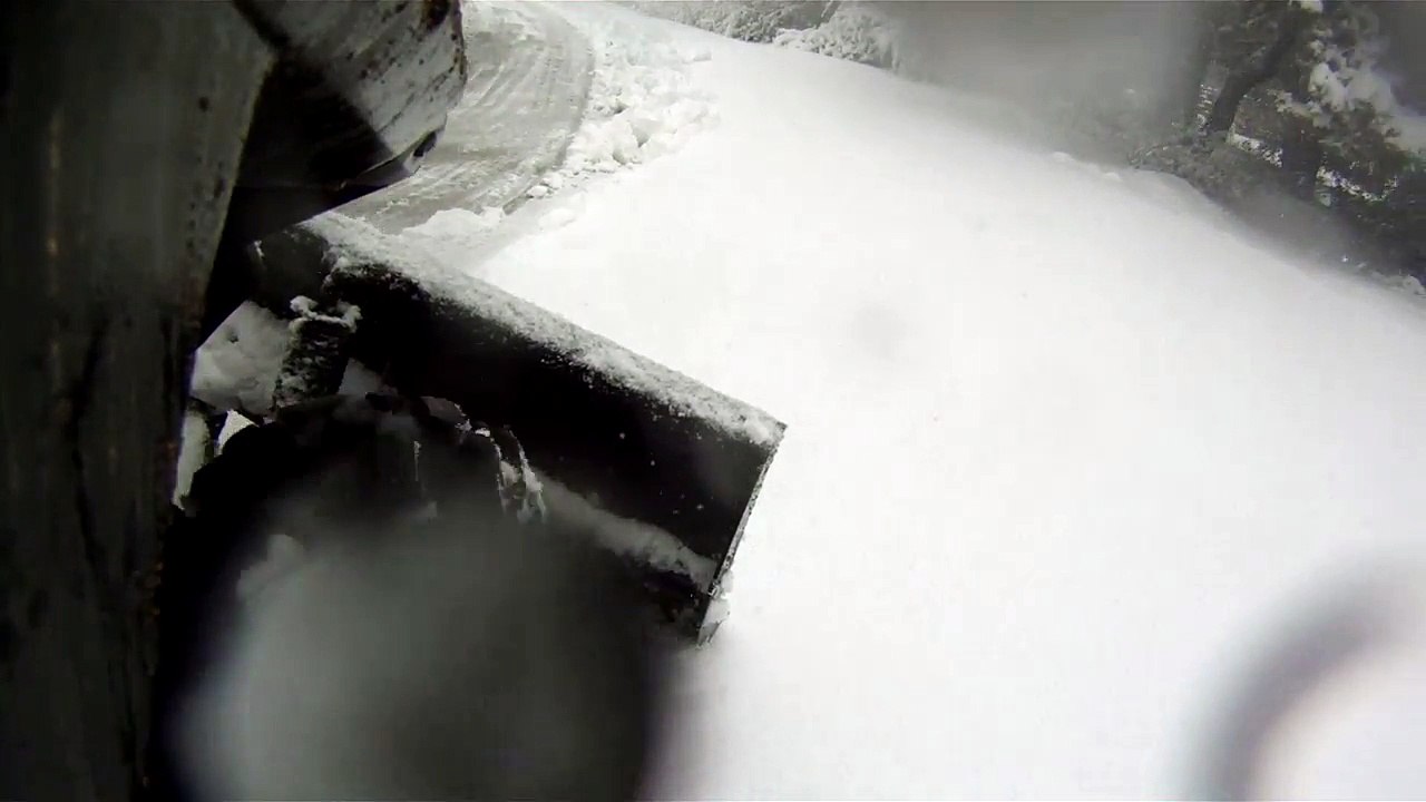 Polaris Glacier Pro Frame and 60  plow blade on 2015 RZR 900 EPS plowing a driveway.