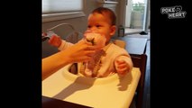 Sweet Baby Enjoys Smelling A Flower - Daily Heart Beat