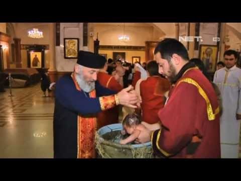 NET12 - Pembaptisan massal 615 bayi di Georgia dalam perayaan Epiphany