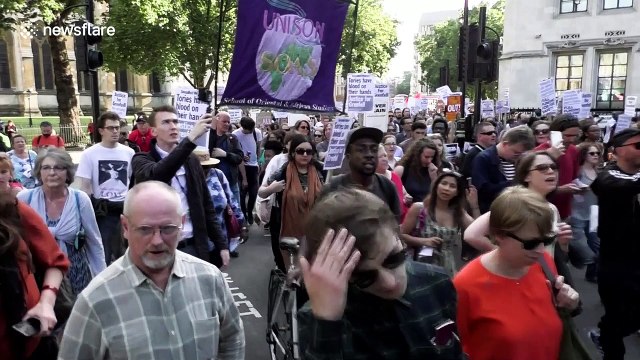 Protesters march on Downing St to call for May to step down