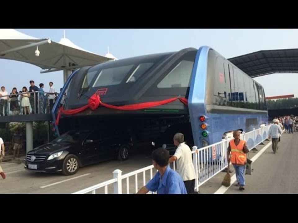 China's futuristic bus that drives above car traffic is finally here