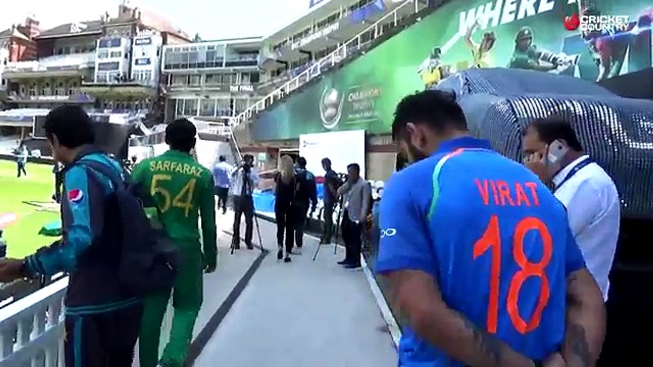 Virat_Kohli,_Sarfraz_Ahmed_during_photoshoot_ahead_of_ICC_Champions_Trophy_2017_